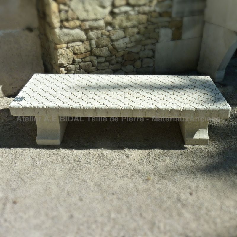 Bench in carved natural limestone by the stone cutter Atelier Alain Bidal, Provence