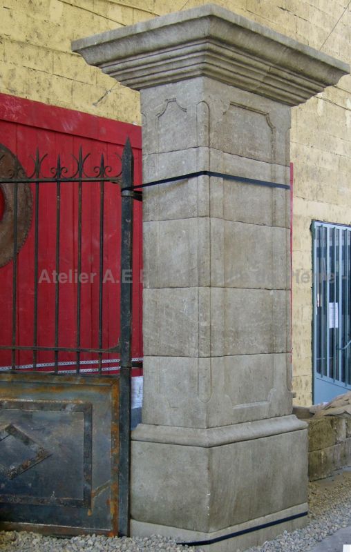 Impressive stone pillars - decorative elements carved in French limestone.