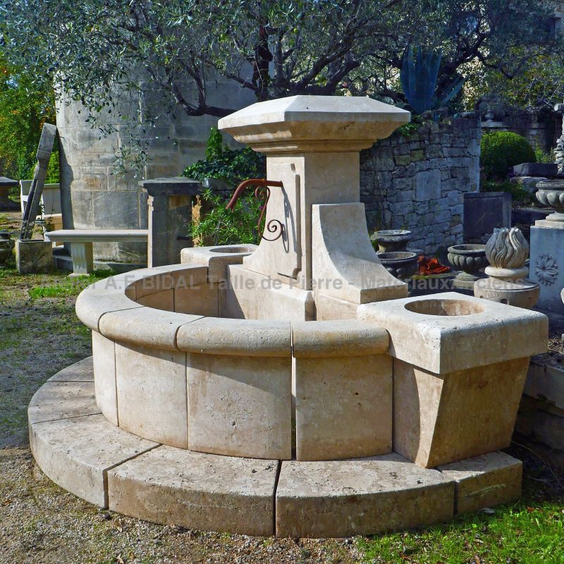 Fountain of Provence : an elegant wall fountain in natural stone by the stonemason Alain BIDAL