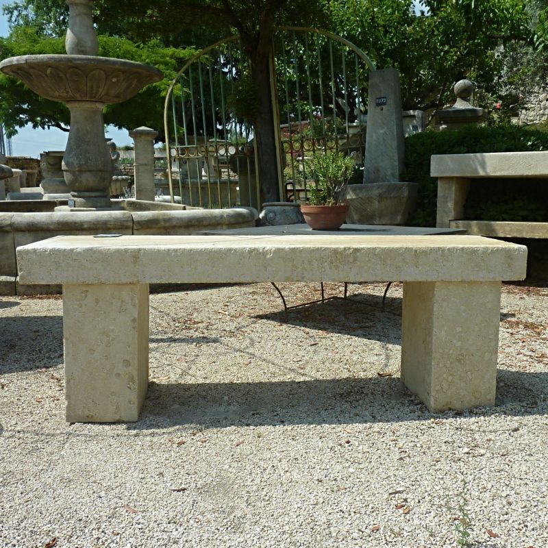 Nice bench in natural stone for a garden or a terrace, signed Alain Bidal, Provence.