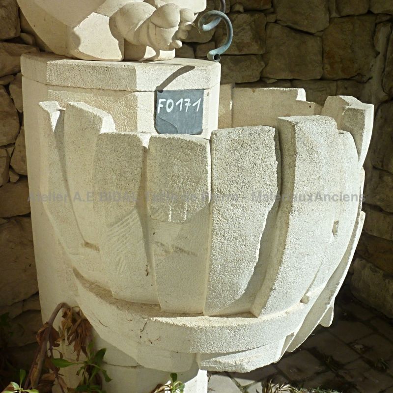 Detail of the basin on our modern stone fountain called Bacchus.