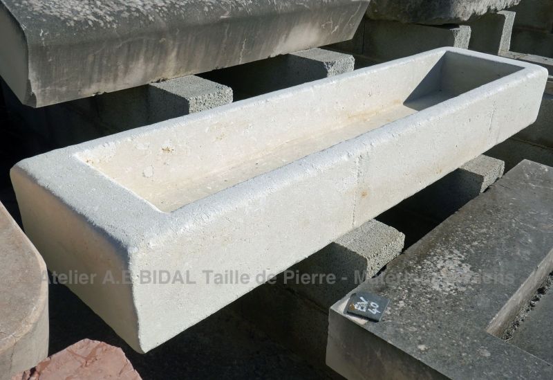 White stone trough : a shallow stone sink by Atelier Alain BIDAL, Provence.