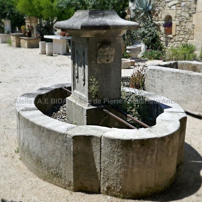 Beautiful village fountain in French limestone - Natural stone fountain of Provence by the atelier Alain BIDAL
