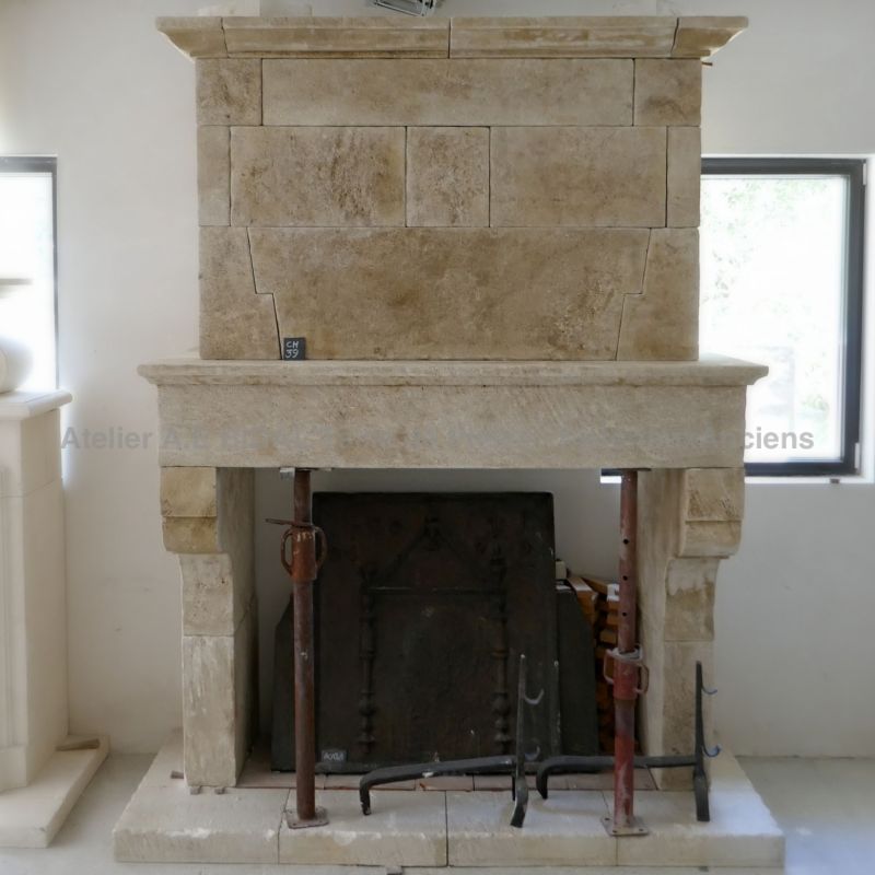 Antique fireplace in stone with trumeau - Mantelpiece for insert by the atelier Alain Bidal in Provence