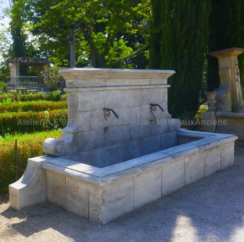 Garden fountain in stone - wall fountain by Ateliers Alain BIDAL (Provence)