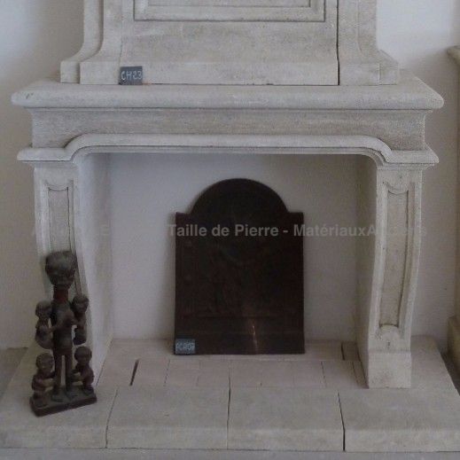 Classic Louis XIII mantel in carved limestone crafted in Provence by Alain BIDAL
