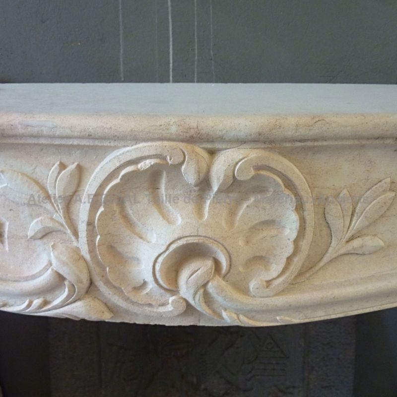 Reedited French Louis XV fireplace in hard stone. A creation by Alain Bidal in Provence.