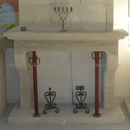 Classic Provence stone fireplace, a decorative element crafted by the Atelier Alain BIDAL (Provence)