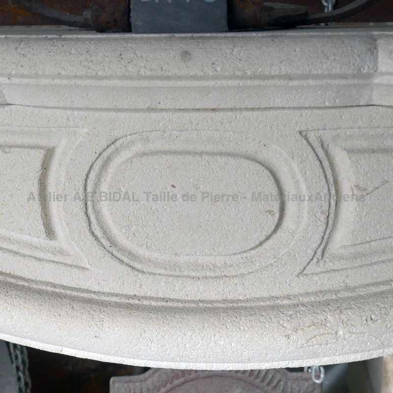 Classic French-Regency style fireplace in stone
