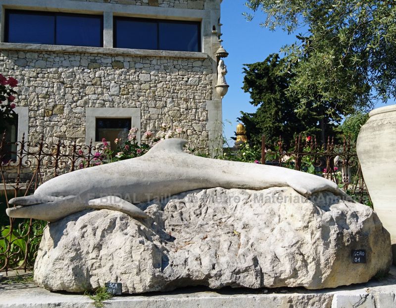 Dolphin : natural stone sculpture by Atelier Alain BIDAL of Isle sur la Sorgue (Provence)