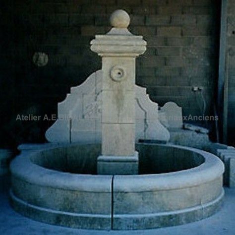 Stone agrden fountain by stone mason A E Bidal