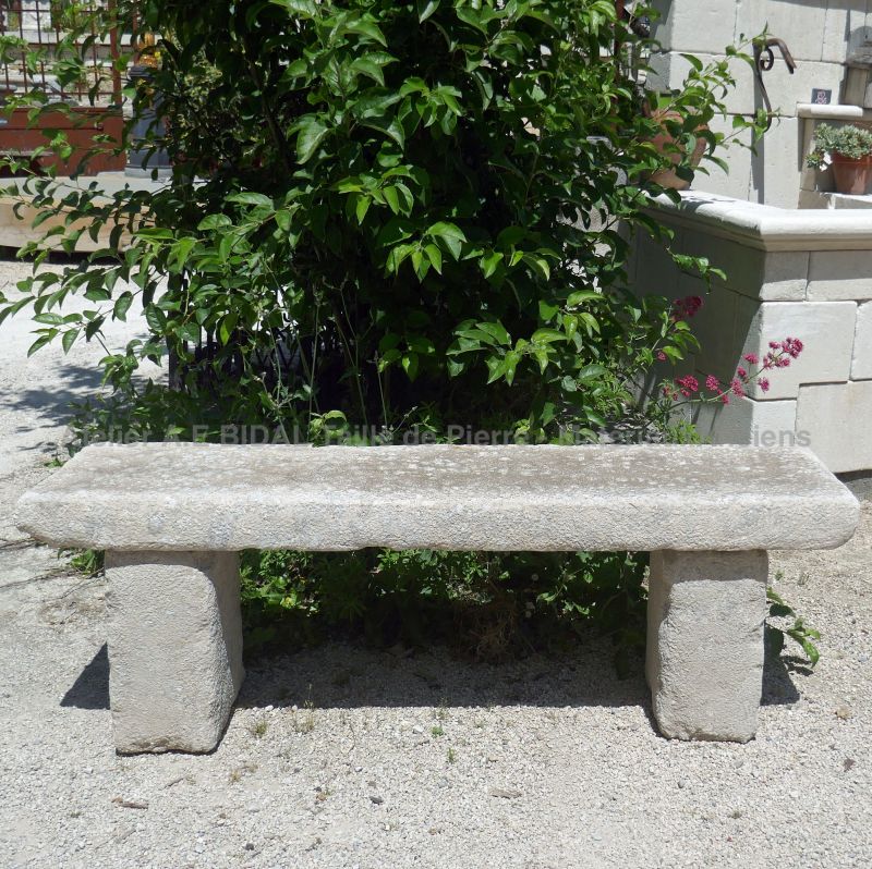 Stone garden furniture : Long bench in natural stone signed Atelier Bidal.
