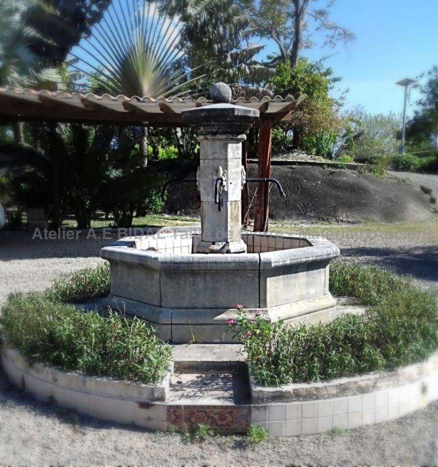 Hand-made Provencal stone fountains | Octagonal stone fountain made by Alain Bidal workshop in Provence.