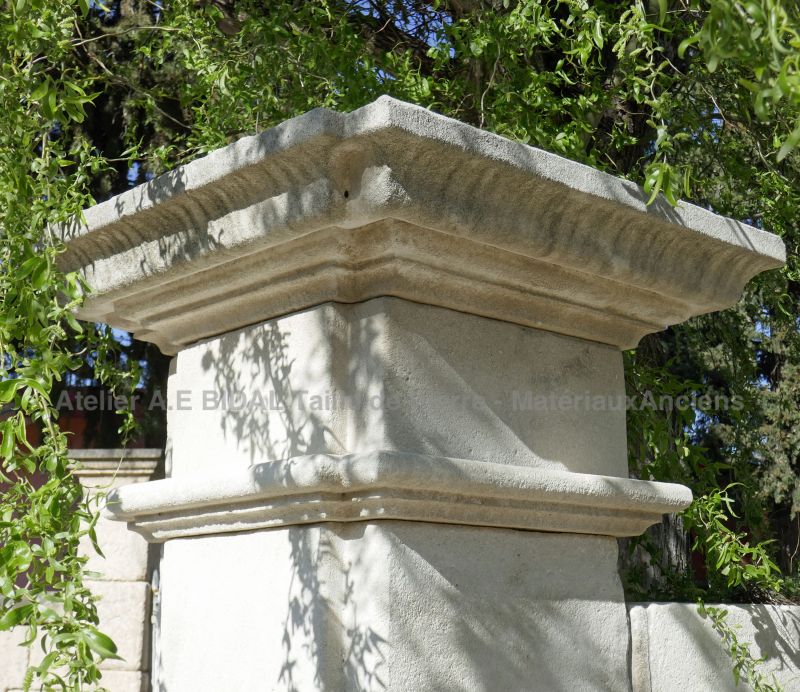 Large flat molded capital - Stone pillars made by Atelier Alain BIDAL, Provence.