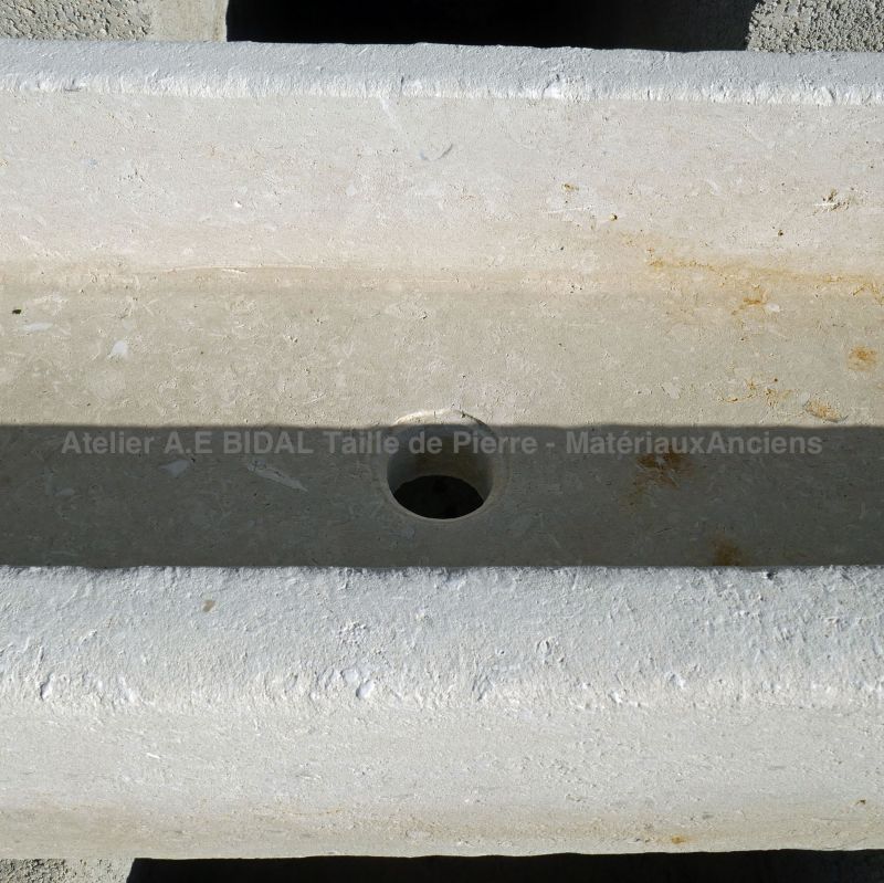 Detail of the hole for the water plug on our white stone sink - Atelier Alain BIDAL ( Provence)