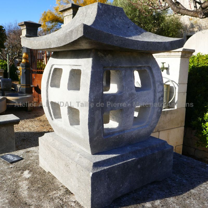 Carved natural limestone outdoors ornament : pagoda light fixture in stone by Atelier Alain BIDAL (Provence).