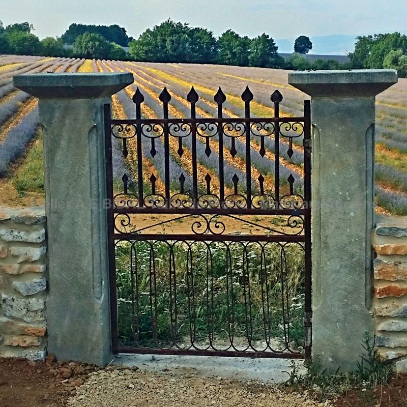 Pair of pillars in stone that will perfectly fit with any outdoor design project.