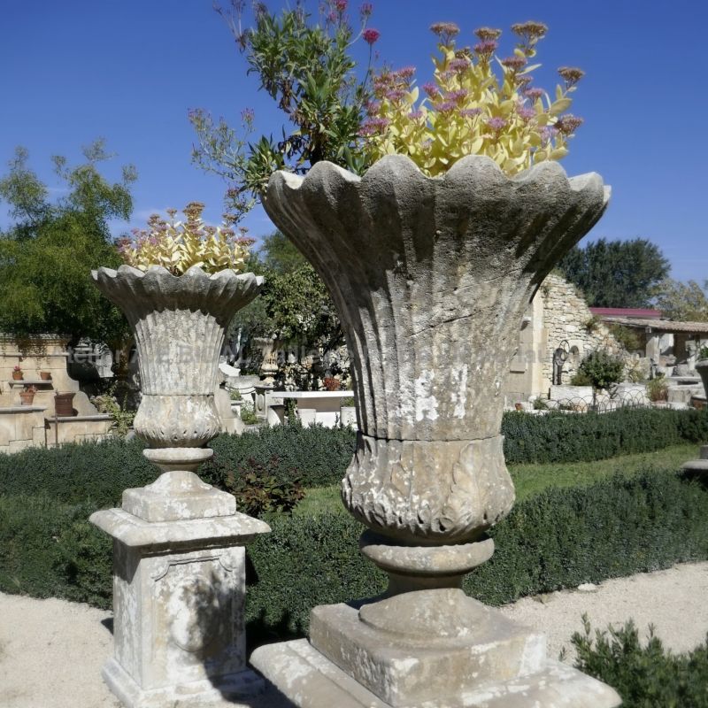 Vase in stone in a tulip form by the Bidal workshop in Provence