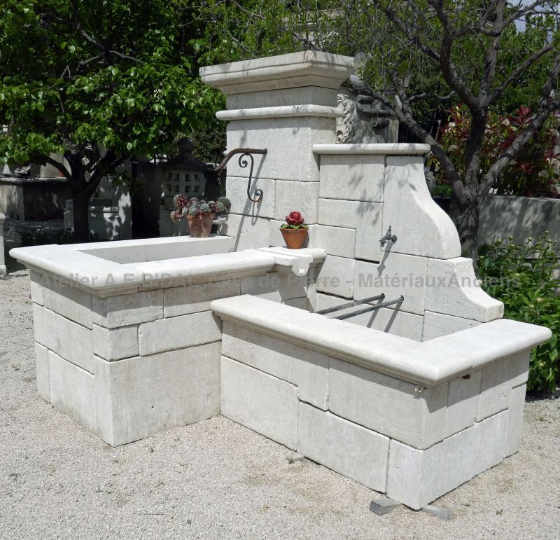 Garden fountain created and built by a stone mason in Provence specialized in stone fountains