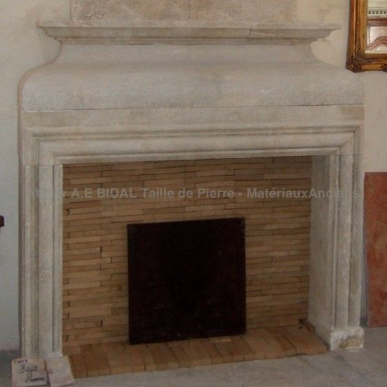 Beautiful Louis XIII fireplace in Estaillades stone with trumeau - Atelier Alain BIDAL (Provence)