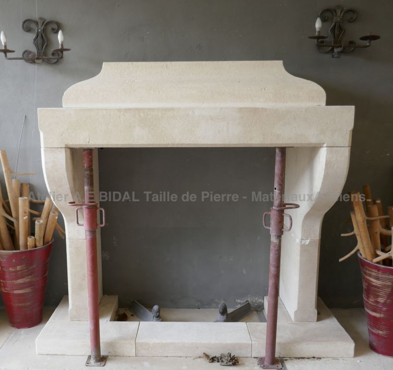 Limestone fireplace carved in Provence by the master craftsman Alain Bidal, stonemason.