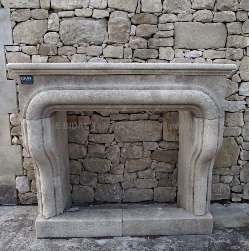 Louis XIII stone fireplace mantel by our stone-cutter Alain BIDAL in Provence