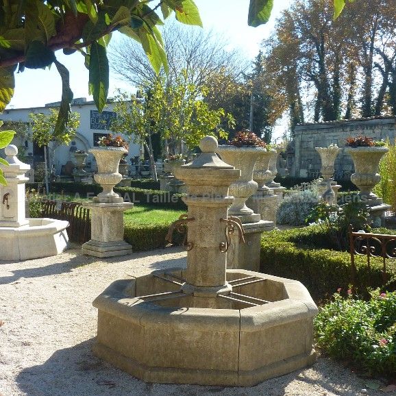 Central fountain in carved limestone crafted in Provence by Alain BIDAL