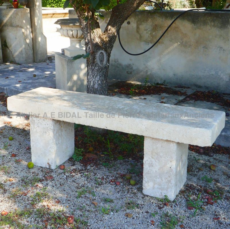 Old-fashioned limestone bench : a long garden bench from Atelier Alain BIDAL (Provence)