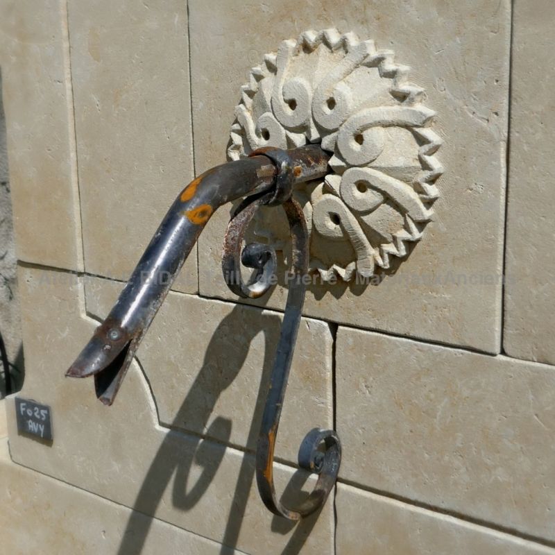 Water outlet on the pediment of our decorative garden fountain in stone - Atelier Alain BIDAL (Provence)