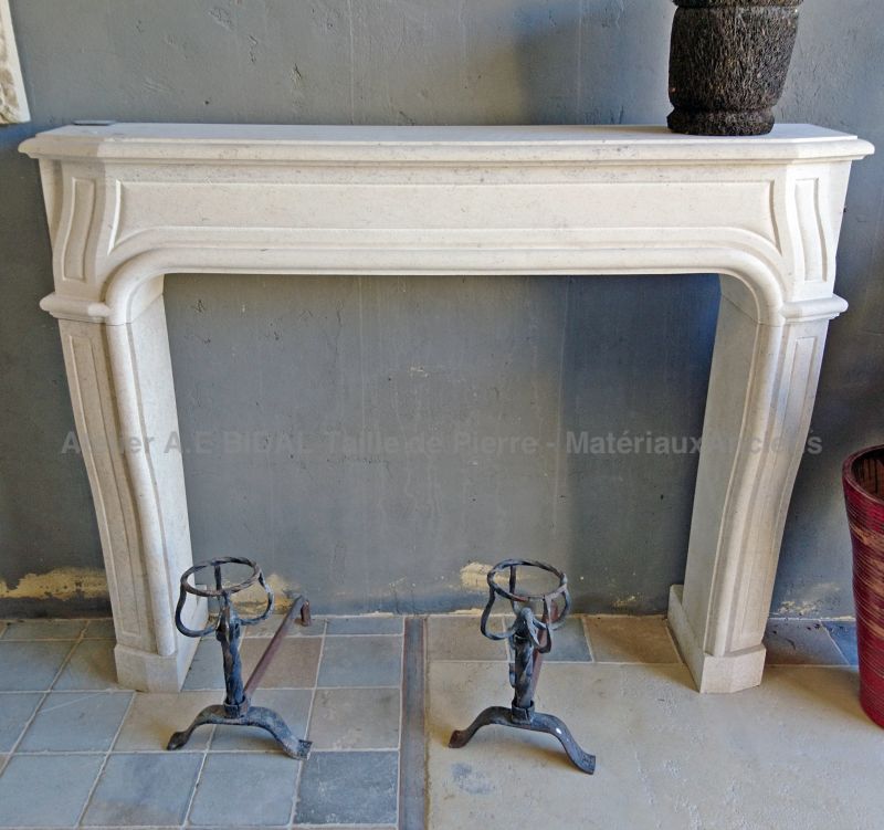 Fireplace of the Louis XIV style carved in the Massangis stone -  Atelier Alain BIDAL (Provence)