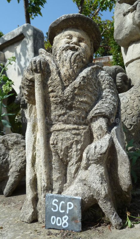 Sculpture en pierre naturelle : berger avec son chien