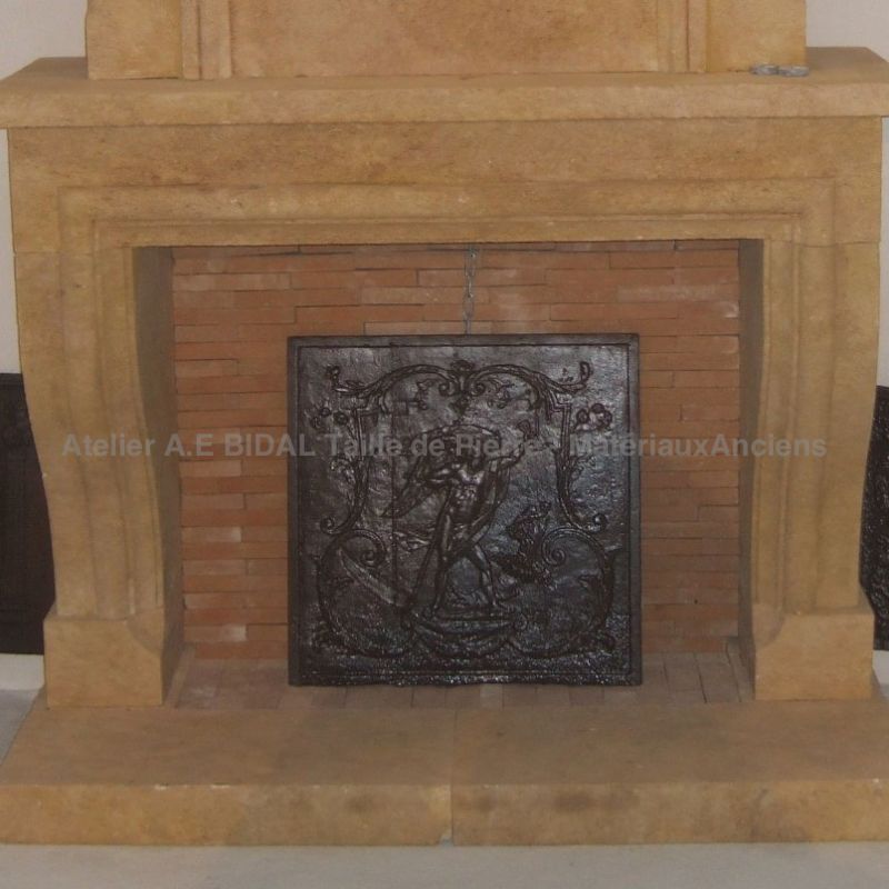 Stone fireplace in the Louis XIII style carved with the greatest of care by our experienced stone masons