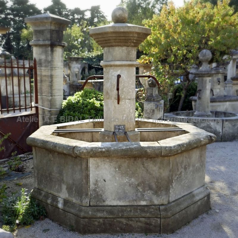 Central octagonal fountain in Avy stone aged and patined