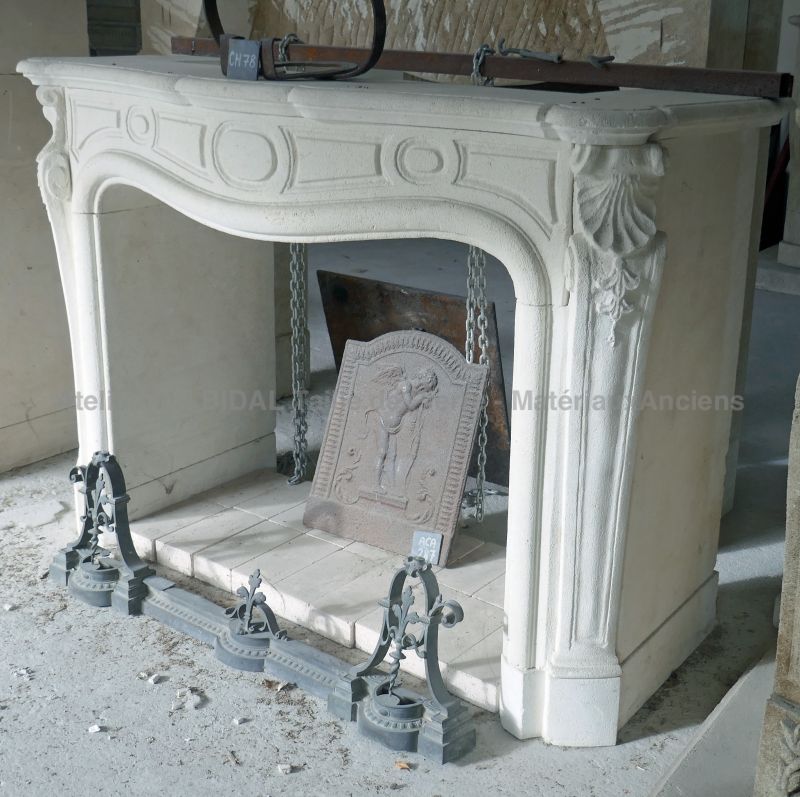 Beautiful French-Regency style fireplace hand crafted in stone for indoor decoration